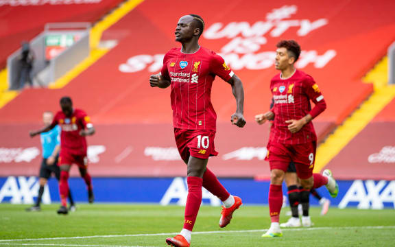 Liverpools Sadio Mane celebrates scoring a goal.