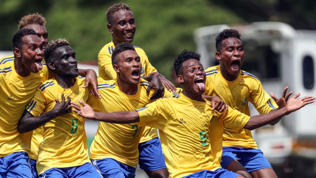 Solomon Islands players celebrate on their way to the World Cup
