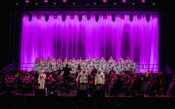 Signature Choir and the NZSO on stage at Spark Arena, Auckland.