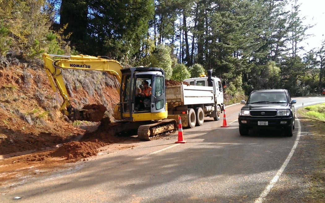 A slip at Mangakahia Road, in Northland, is cleared.