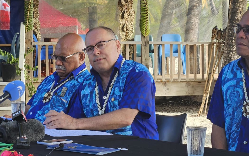 Mark Brown announcing the final outcomes in Aitutaki.