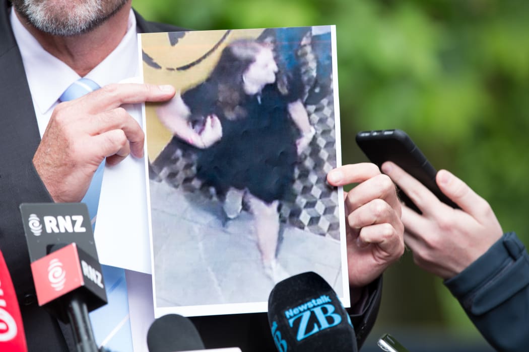 Detective Inspector Scott Baird showing media the last image/sighting they have of Grace Millane.