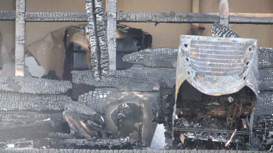 The flats - in the industrial area of Glendene, Auckland - were destroyed by the fire on Friday 25 September 2015.
