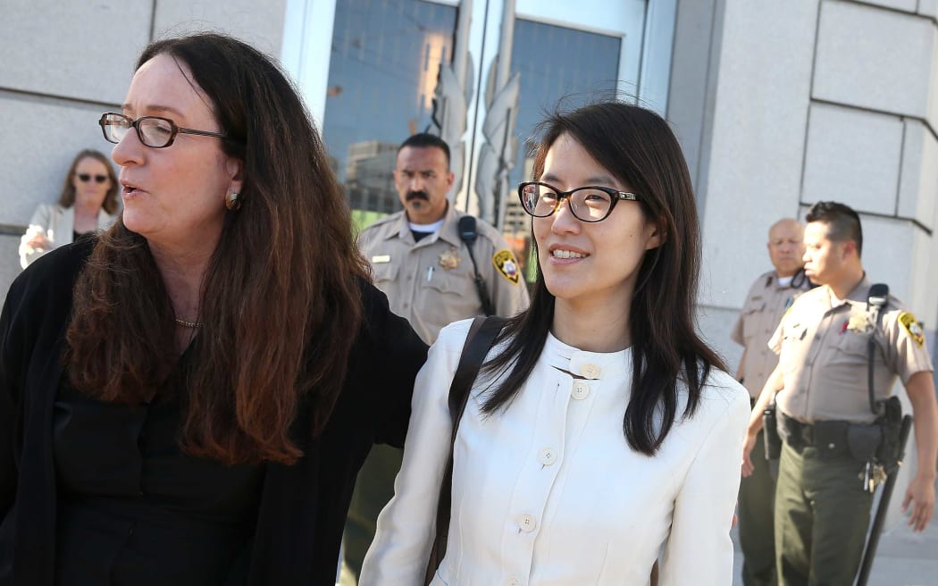 Ellen Pao (R) leaves the San Francisco Superior Court Civic Center Courthouse with her attorney Therese Lawless on March 27, 2015. A jury found no gender bias against her.