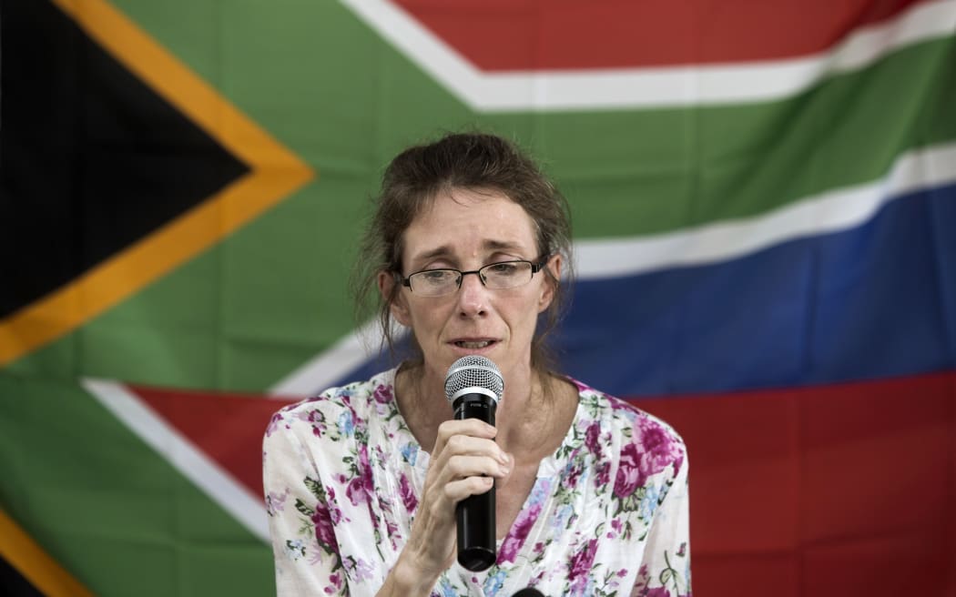 Yolande Korkie, a former hostage and wife of Pierre Korkie, speaks to media in Johannesburg to appeal for her husband's release (16 January 2014).