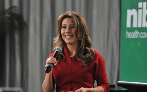 Lili Gil Valletta speaking at the Super Diverse Womens' Conference
