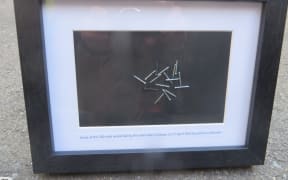 The "Harder than nails" collectable plaque is for sale on Trade Me.
