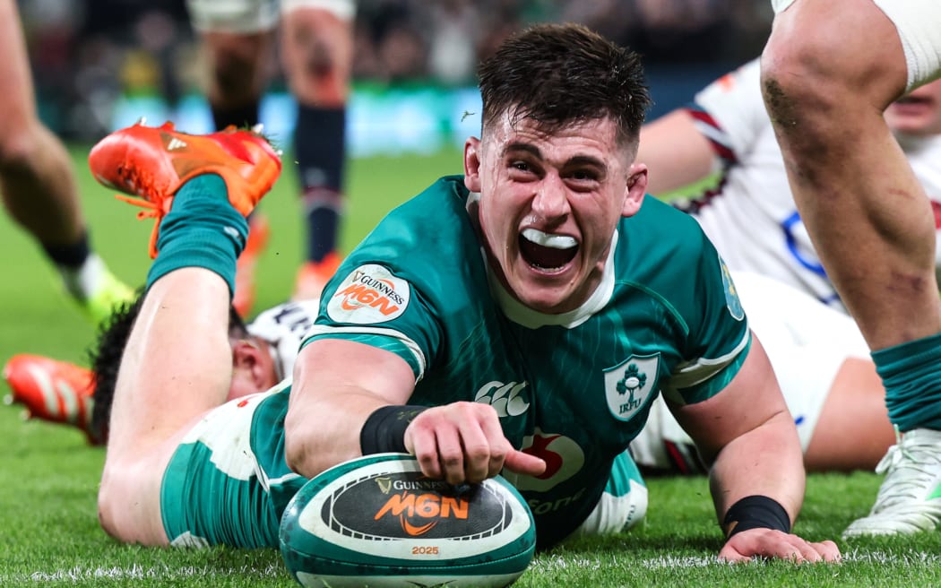 Ireland’s Dan Sheehan celebrates scoring a  try for Ireland.