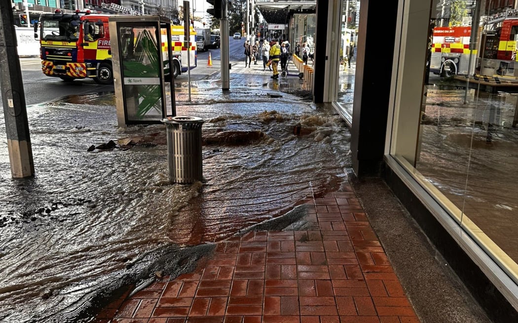 Flooding due to a broken water main in Queen Street.