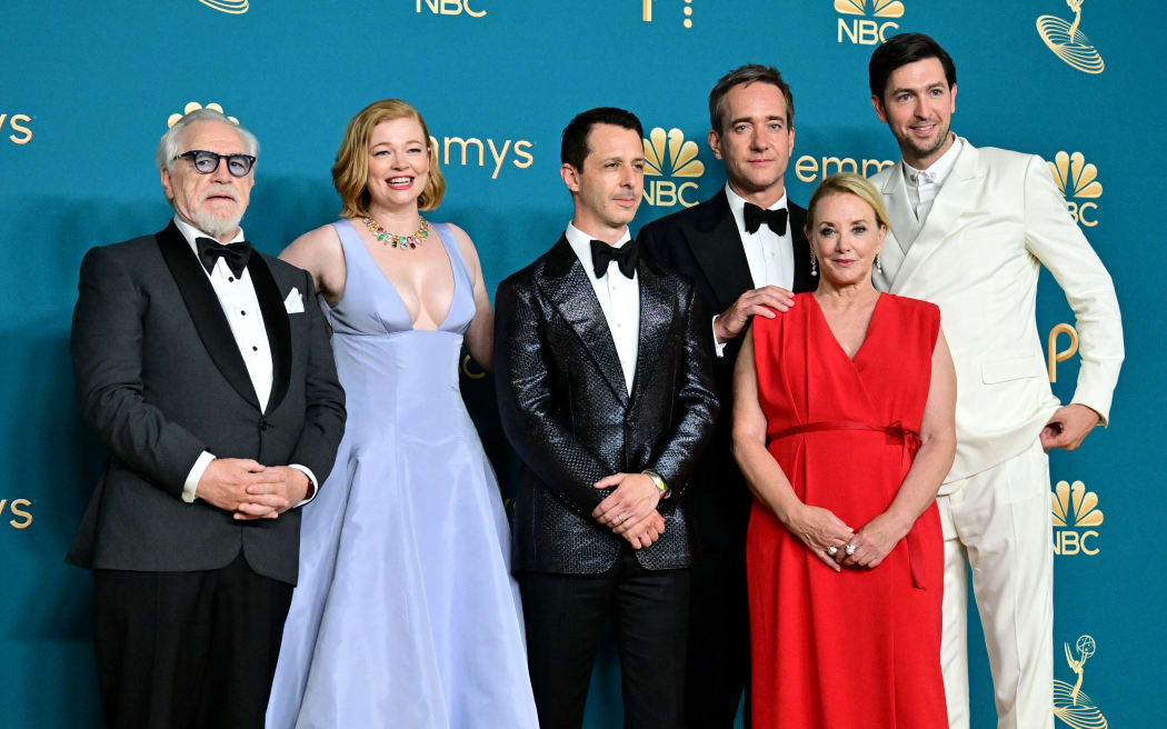 (FILES) (L-R) Scottish actor Brian Cox, Australian actress Sarah Snook, US actor Jeremy Strong, British actor Matthew Macfayden, US actress J. Smith-Cameron, and US actor Nicholas Braun pose after winning the Emmy for Outstanding Drama Series for "Succession" during the 74th Emmy Awards at the Microsoft Theater in Los Angeles, California, on September 12, 2022. "Succession," the HBO drama about an ultra-wealthy family fighting for control of a sinister media empire, led the nominations on July 12, 2023, for the Emmys -- television's version of the Oscars. Nominations were announced by "Community" star Yvette Nicole Brown, in a live-streamed ceremony hosted by Frank Scherma, chairman of the Television Academy, which organizes the awards. (Photo by Frederic J. Brown / AFP)