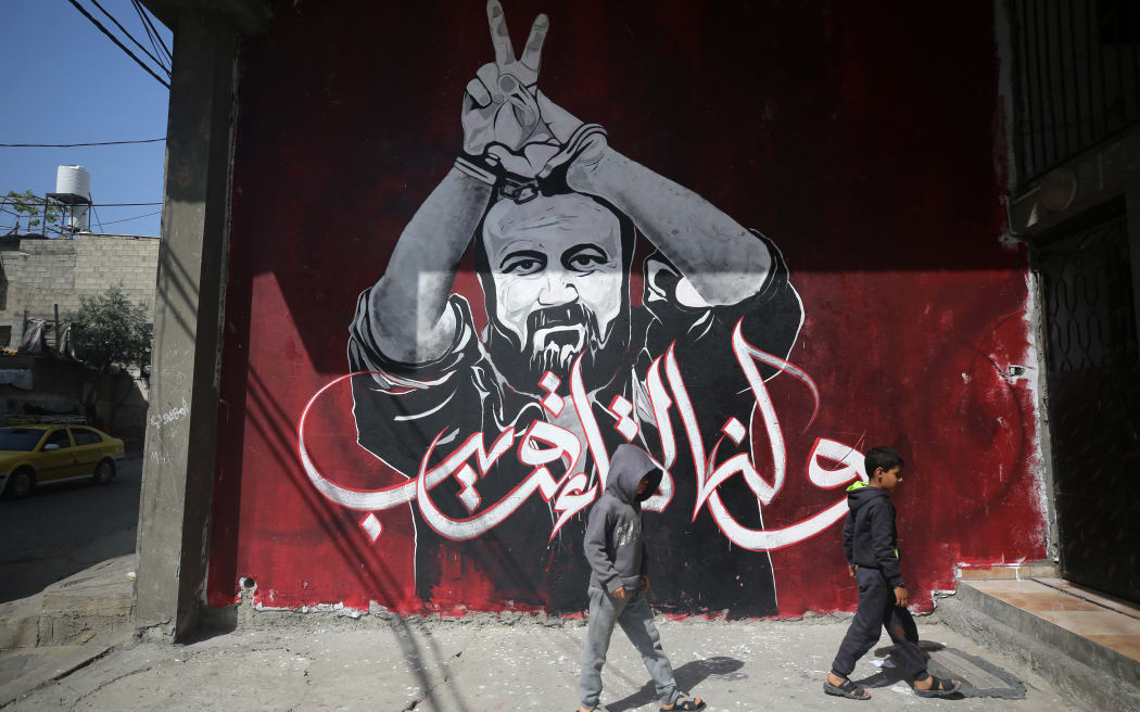 A big mural shows jailed Fatah leader Marwan Barghouti, in Jabalia refugee camp in the northern Gaza Strip on 16 April, 2023.