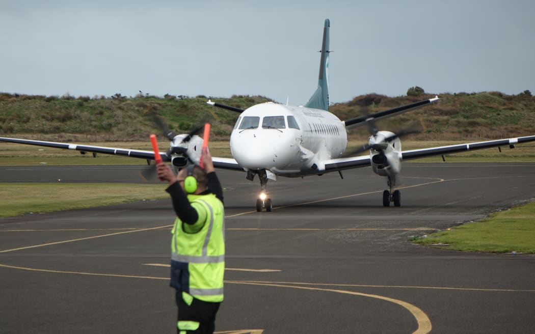 The arrival of the first Air Chathams plane at Whanganui airport.