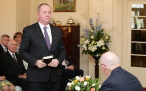 Barnaby Joyce being sworn in by Governor-General Peter Cosgrove during the new cabinet swearing-in ceremony at Government House in Canberra on September 21, 2015.