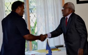 Governor General Sir Frank Ofagiaro Kabuiwelcomes the reinstated Minister for Infrastructure Development, Hon JimmyLusibaea. 06-05-2016