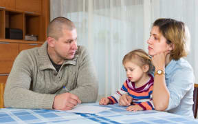 A photo of parents having a serious discussion