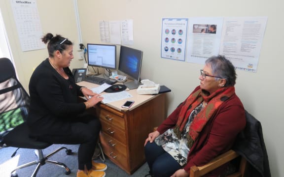 Lead vaccinator Robyn Preece and Glenise Day ahead of Glenise getting her first dose of Pfizer