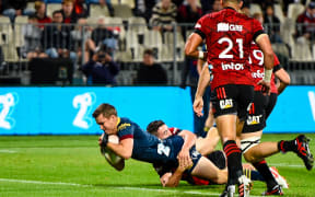 Michael Collins of the Highlanders scores a try in the tackle of  Codie Taylor of the Crusaders during the Super Rugby Aotearoa rugby match, Crusaders V Highlanders, at Orangetheory Stadium, Christchurch, New Zealand, 2nd April 2021.