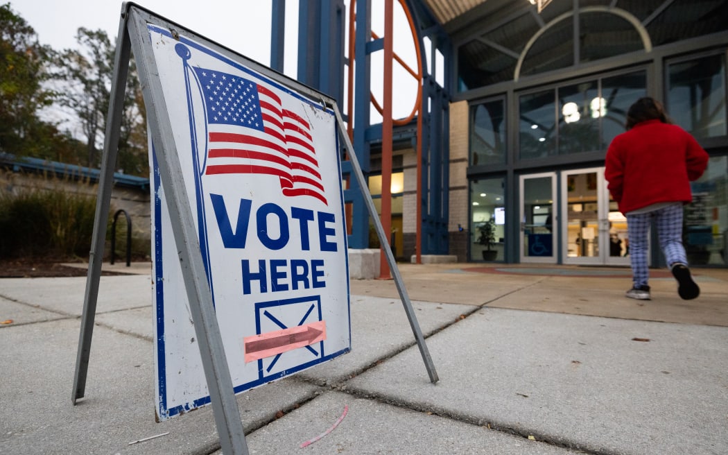 NORCROSS, GEORGIA - NOVEMBER 5: A voter enter the polling station at Lucky Shoals Park Recreation Center on November 5, 2024 in Norcross, Georgia. Americans cast their ballots today in the presidential race between Republican nominee former President Donald Trump and Democratic nominee Vice President Kamala Harris, as well as multiple state elections that will determine the balance of power in Congress.   Jessica McGowan/Getty Images/AFP (Photo by Jessica McGowan / GETTY IMAGES NORTH AMERICA / Getty Images via AFP)