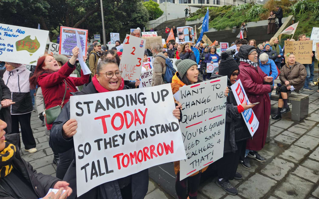 Teachers strike outside Parliament on Wednesday.