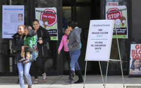 Signs advertising free measles vaccines and information about measles are displayed at the Rockland County Health Department, in Pomona, N.Y.