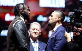 Deontay Wilder of United States and Joseph Parker of New Zealand face-off during the Day Of Reckoning Press Conference.