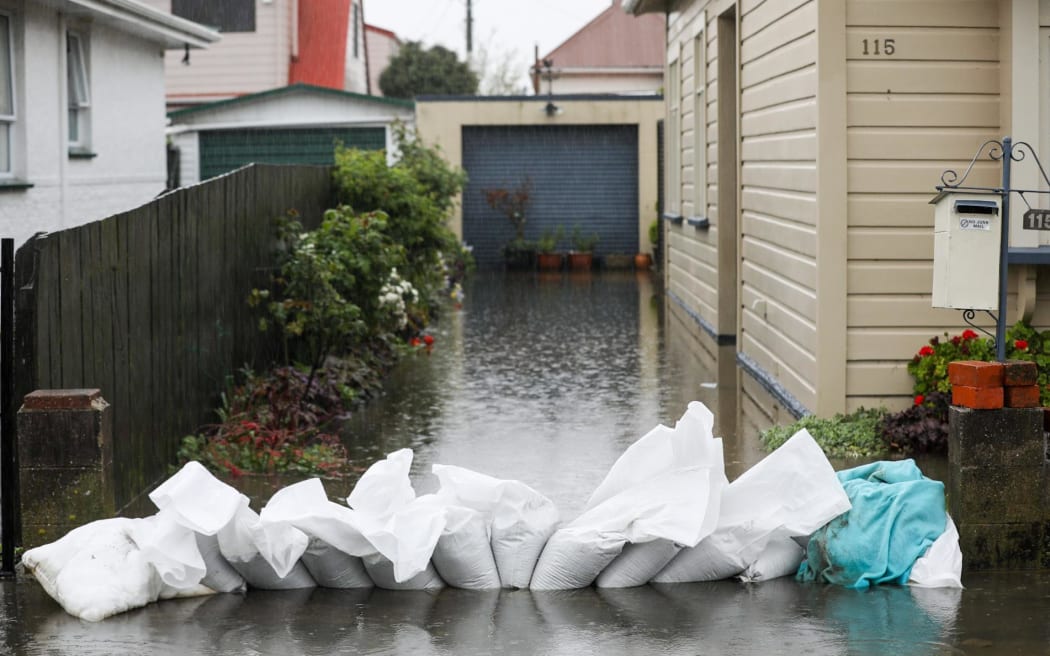 Scenes on Surrey Street, South Dunedin, Friday evening.