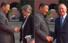 Former New Zealand prime ministers Helen Clark and John Key shake hands with China President Xi Jinping before a parade to mark 80 years since the end of World War II.