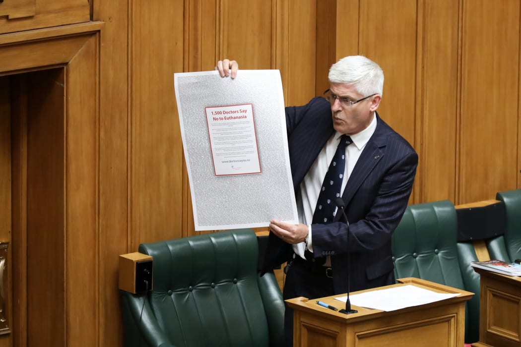 National MP Tim McIndoe has brought visual aids. This one is a full page advert by doctors opposed to the End of Life Choice Bill.