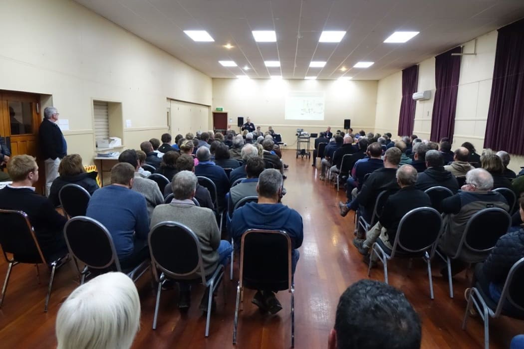 A meeting of 150 farmers at Weston Hall in North Otago about the spread of the cow disease mycoplasma bovis.