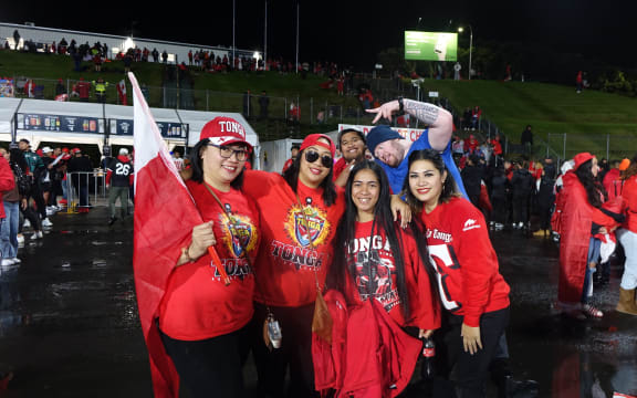 Despite some rain, Tonga fans kept up the cheer during halftime.