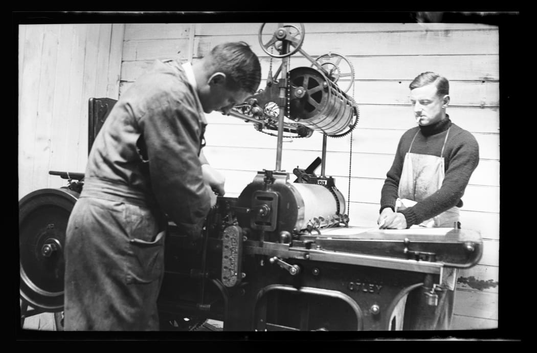 Denis Glover and John Drew at Caxton Press in 1934 shot by Jean Bertram