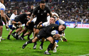Aaron Smith heads for the try line in the All Blacks' Rugby World cup pool clash with Italy.