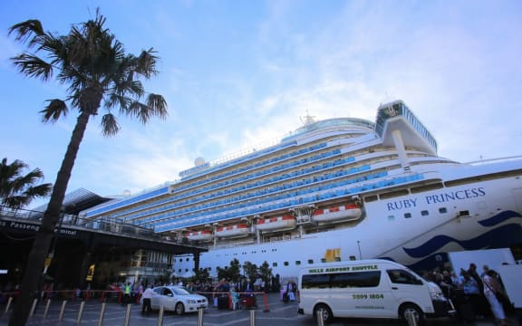 SYDNEY, AUSTRALIA - MARCH 19: The Ruby Princess cruise ship is seen docked at at the Overseas Passenger Terminal, days after Australian Prime Minister Scott Morrison announced that international cruise ships would no longer be allowed to dock at Australian ports.