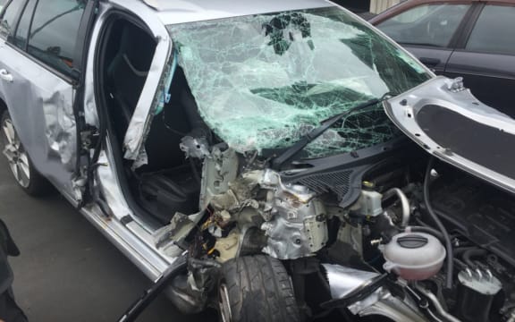 Police say the woman's wallet was removed from the car after the crash.