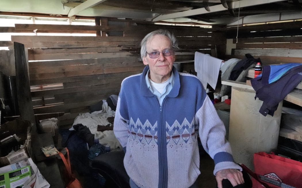 Arnold Kalnins, 80, has been sleeping on a mattress on the floor of a tool shed since his home was destroyed by fire.