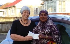 volunteer Janet (left) and driver Suldano (right) after Suldano passed her test.
