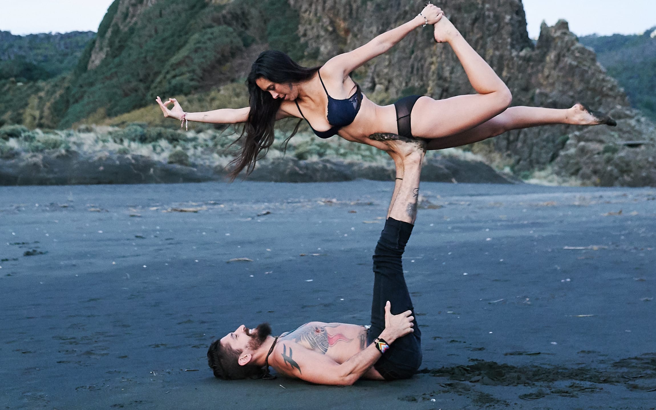 Franko Heke and Nikki Rhodes doing yoga