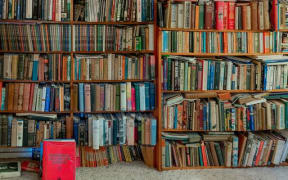 Books in a bookcase in a home office