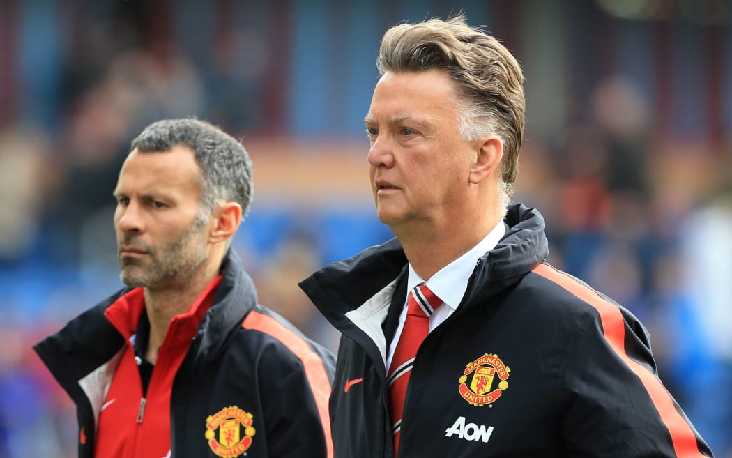 Barclays Premier League - Burnley v Manchester United - Man Utd manager Louis van Gaal (R) and assistant Ryan Giggs. 2014.