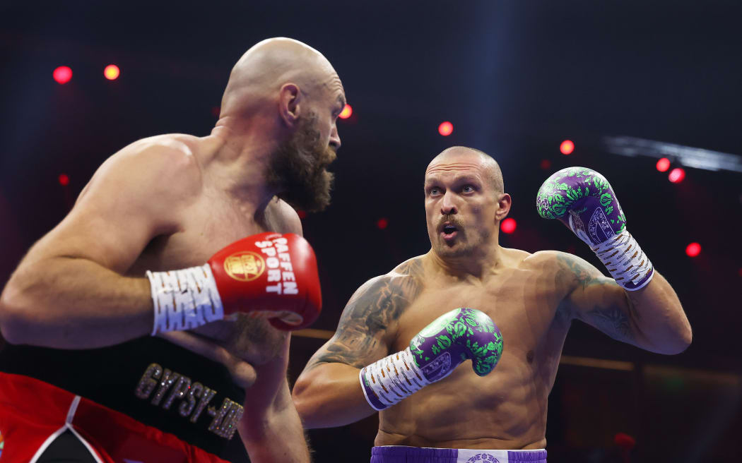 Oleksandr Usyk looks on against Tyson Fury during World Heavyweight titles' fight. 22 December 2024.