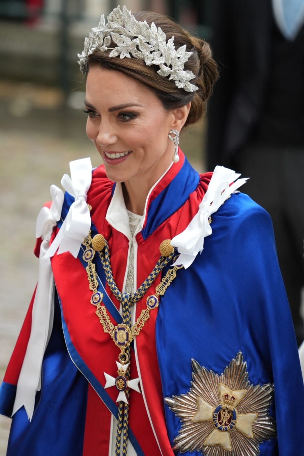 Catherine, Princess of Wales arrives at Westminster Abbey, wearing her formal robes.