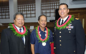 US Army Regan Test Site Commander Col. Thomas Pugsley, right, with Members of Parliament Stephen Phillip and Hiroshi Yamamura at the August 2021 opening of parliament in Majuro. He announced changed Covid prevention protocols this week following a breach of entry requirements