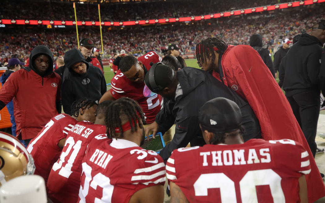 Defensive Backs Coach Daniel Bullocks of the San Francisco 49ers with the defensive backs on the sideline during the NFC Divisional Playoff game against the Green Bay Packers at Levi's Stadium.