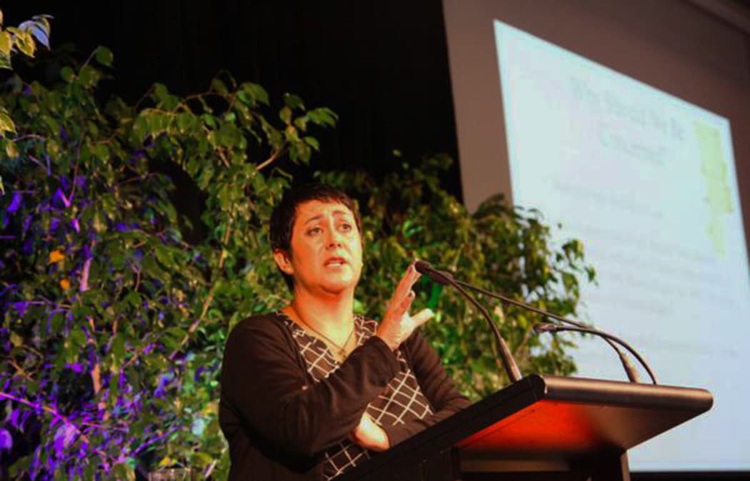 Khylee Quince speaks at a past Drug Foundation symposium.