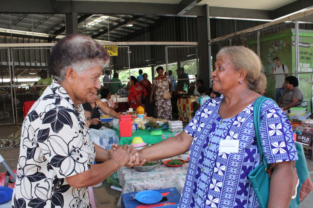 Vanuatu’s Luganville Municipal Council representative, Catherine Leo, meets Nadi Market Vendor Association President, Lia Lawanamate during the field visit to Nadi Market.18 Nov 2016