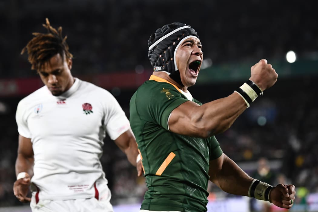 South Africa's wing Cheslin Kolbe celebrates after scoring his try.