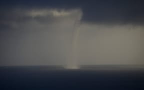 Waterspouts formed near Waiheke Island before moving into the Firth of Thames.
