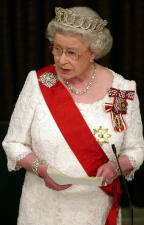 Queen Elizabeth II delivers her speech to the New Zealand Parliament during a state dinner at the Beehive in Wellington, 25 February 2002, during her Golden Jubilee tour.
