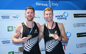 Ben Taylor and Oliver Welch after winning gold in the Men's Pair at the World Cup regatta, Italy, 2025.