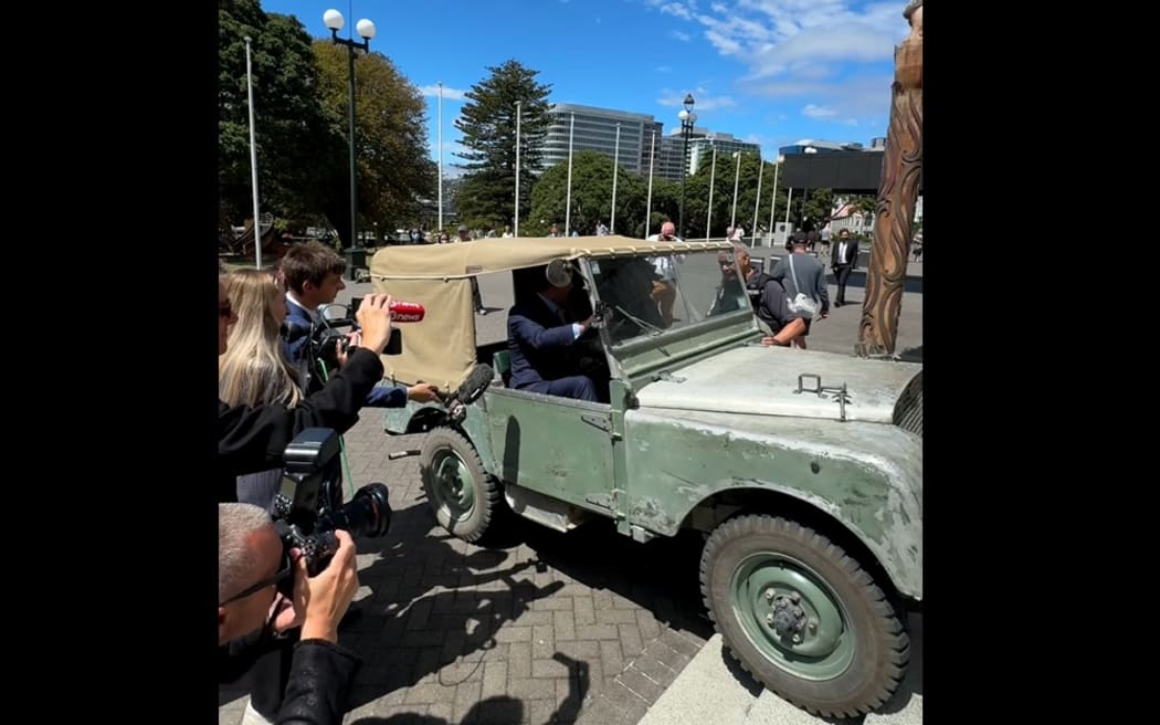 David Seymour starts to drive a Land Rover up the steps of Parliament, in a screenshot from the Act Party's video of the event.